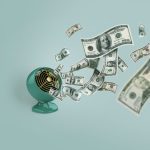 Money down the drain, concept. Losing money, a creative idea. Vintage fan blowing